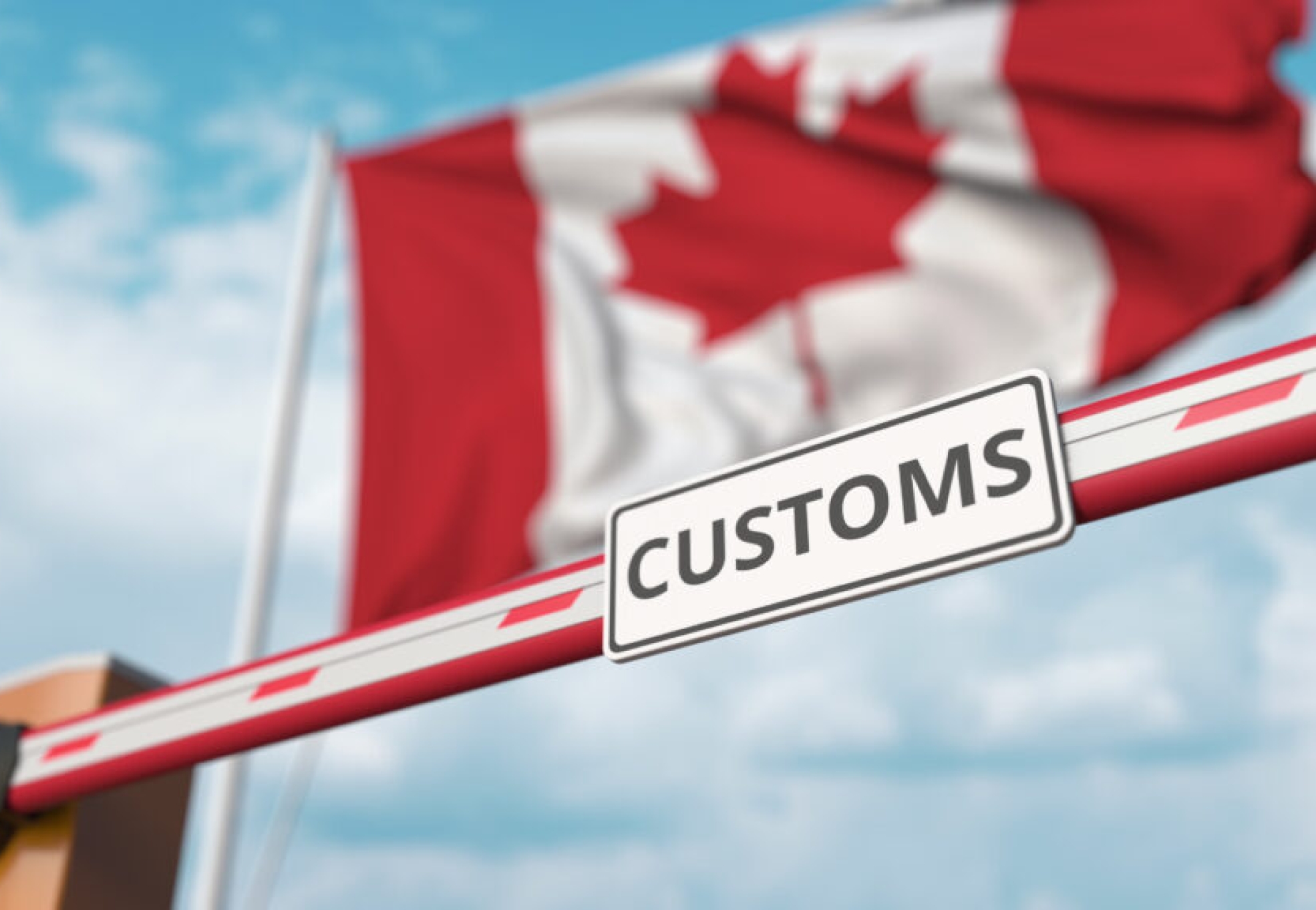 Closing,Boom,Barrier,With,Customs,Sign,Against,The,Canadian,Flag.